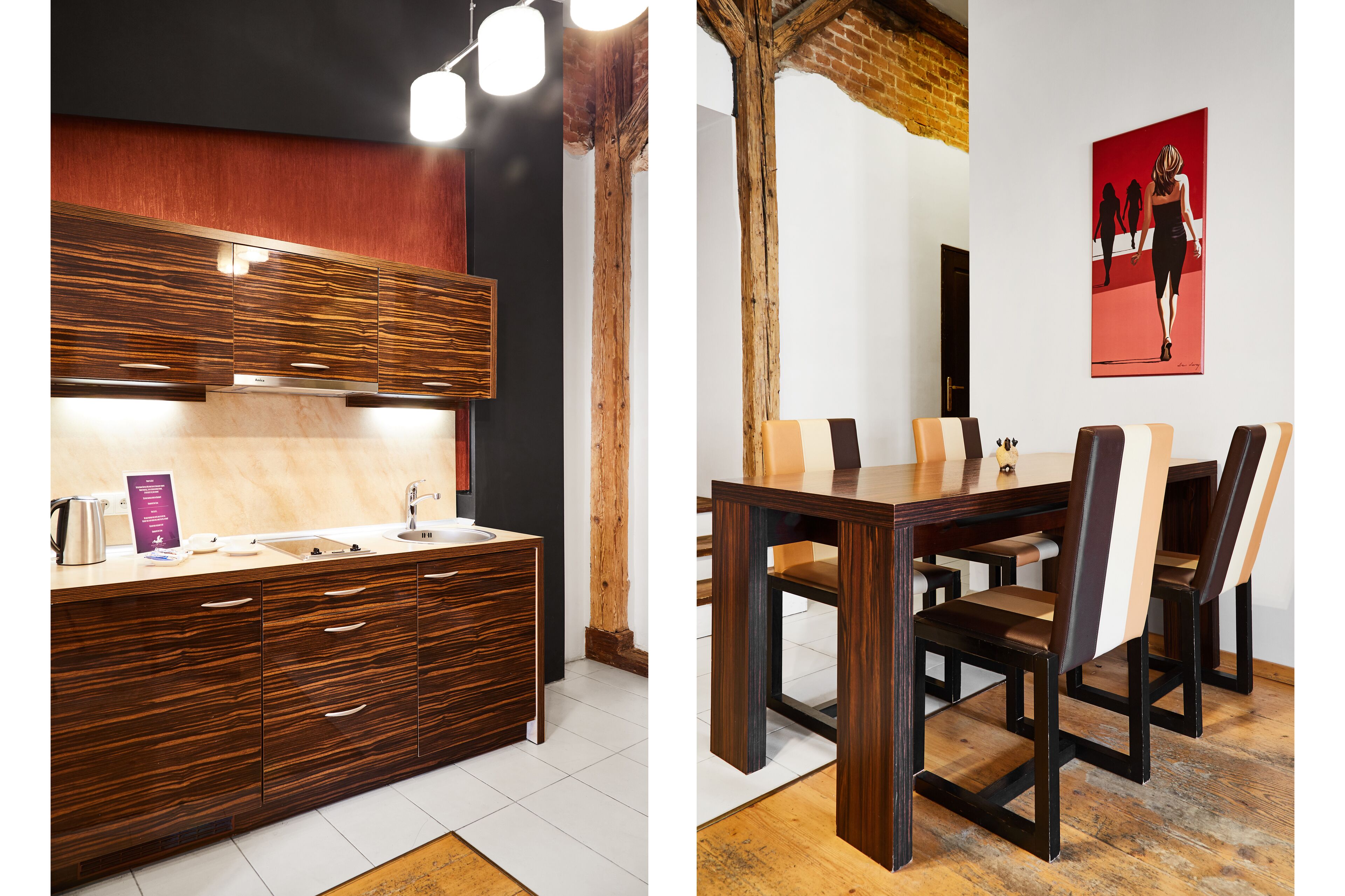 Una cocina moderna con encimera de madera y un comedor con mesa y sillas de madera.