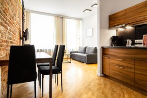 Family Apartment, 1 Double Bed with Sofa bed, City View | Living room | TV