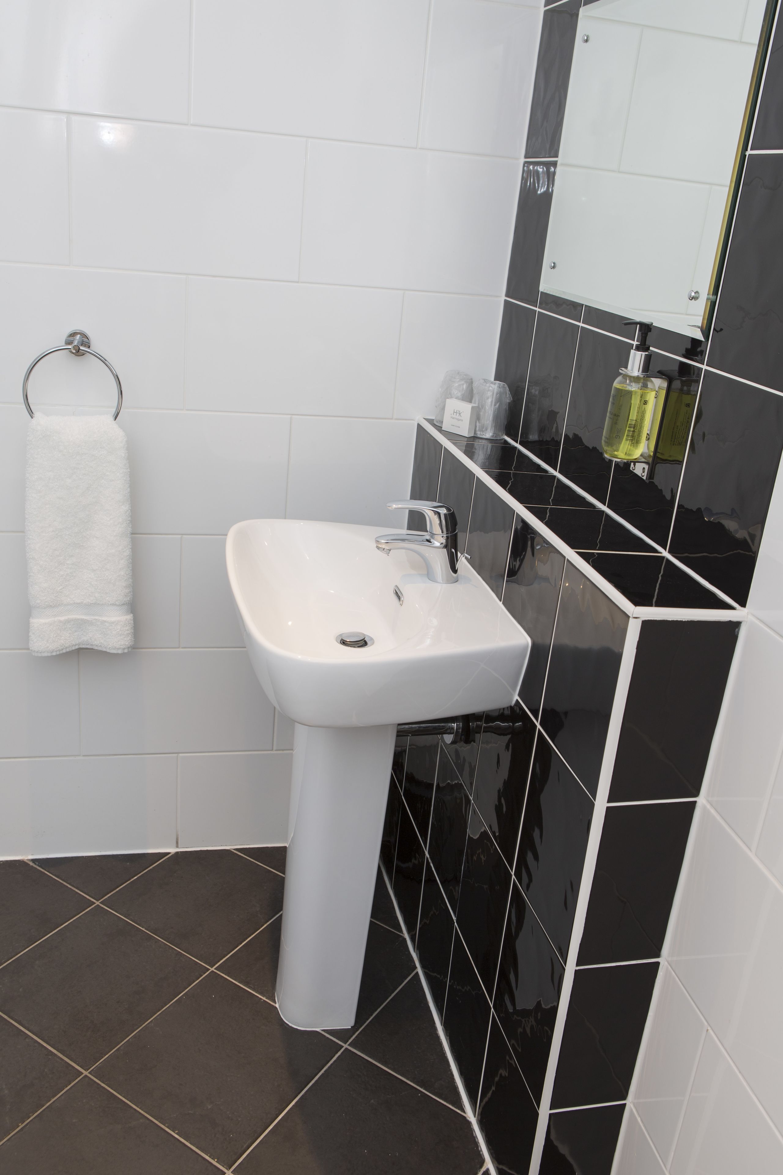 combined shower/bathtub, hair dryer, towels, soap