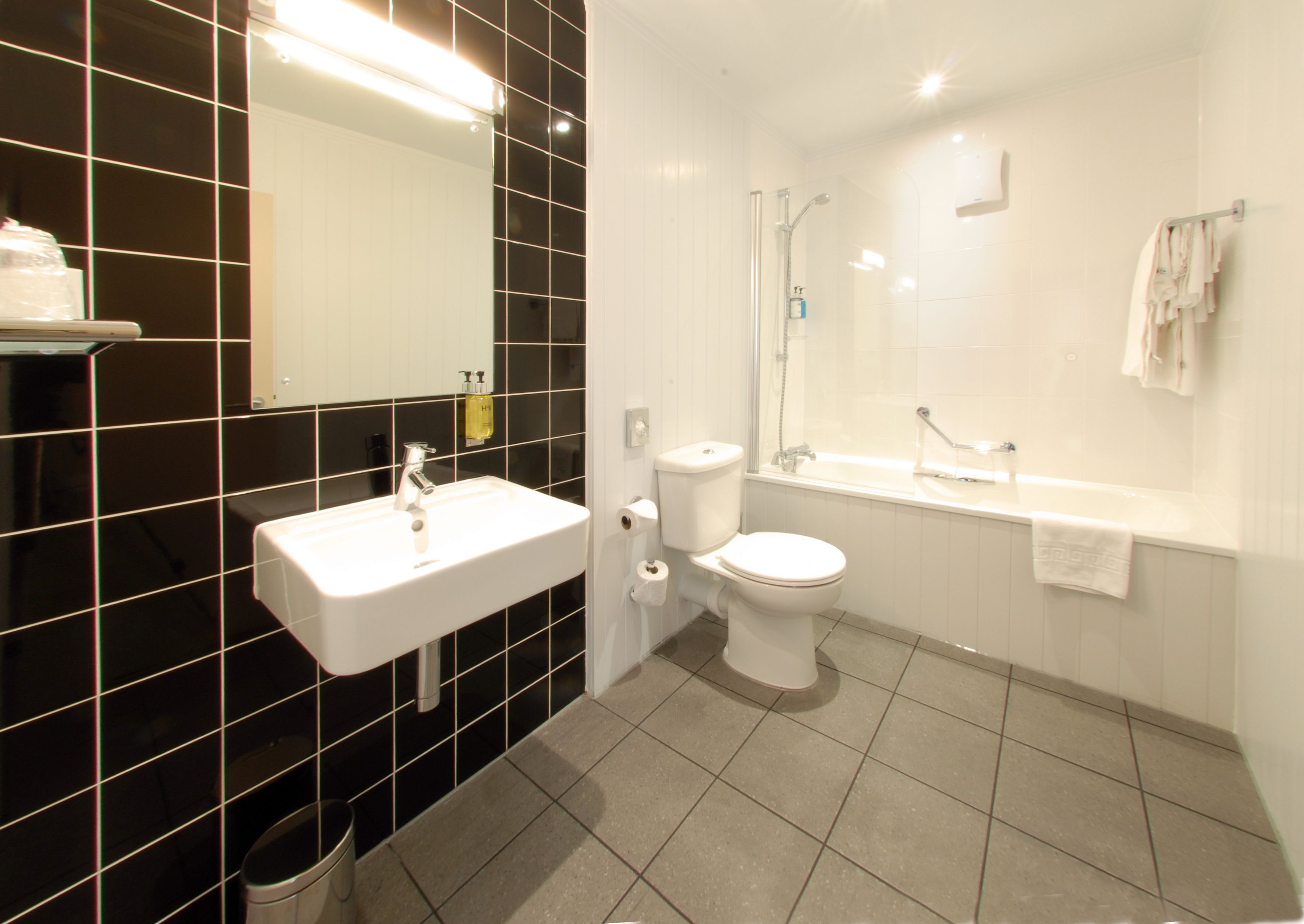 twin room | bathroom | combined shower/bathtub, hair dryer, towels, soap