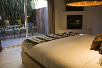 In-room safe, individually decorated, blackout drapes at Blue Sands Inn, A Kirkwood Collection Hotel