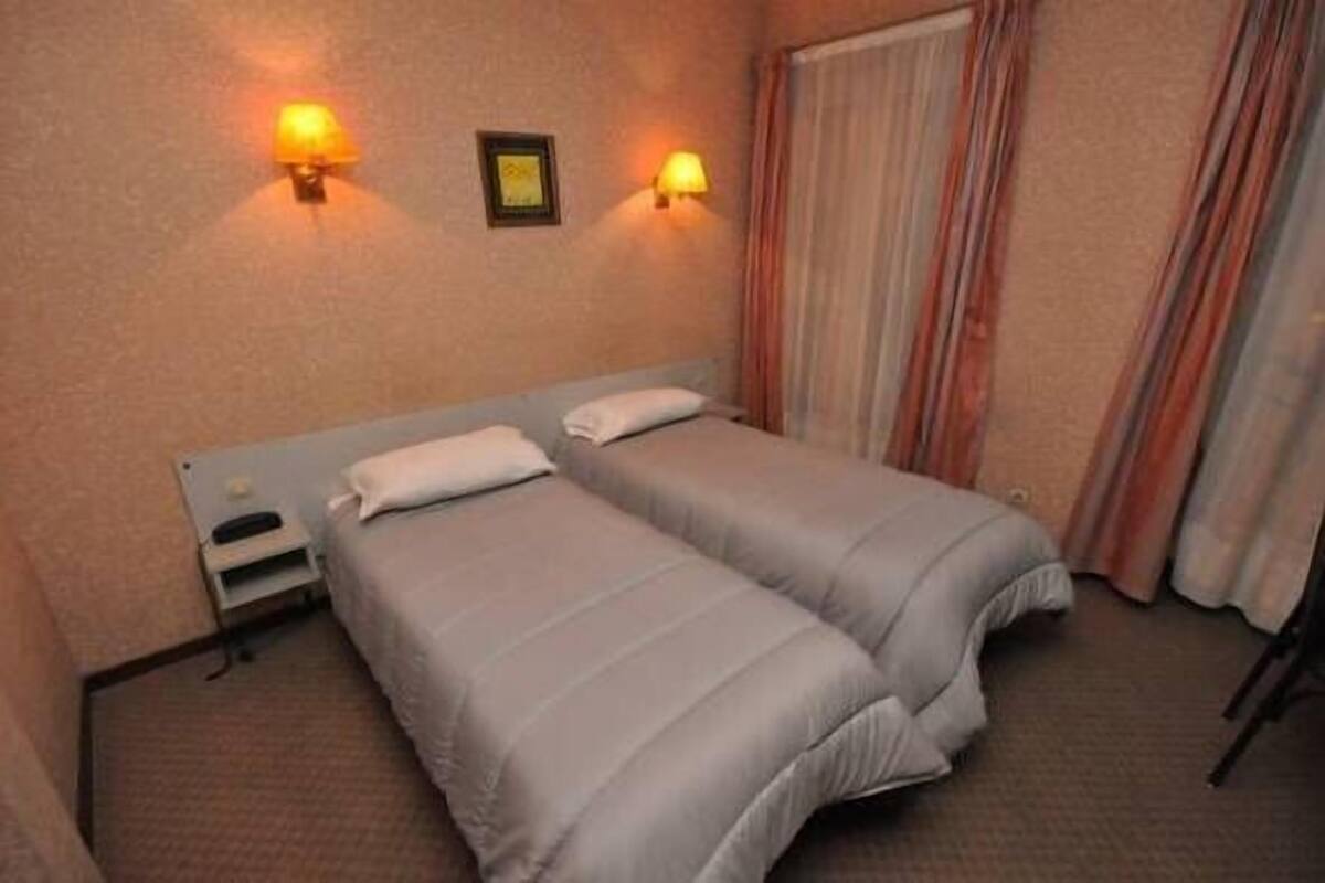 Twin Room | Soundproofing, iron/ironing board (on request), rollaway beds