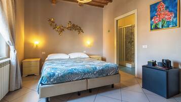 Premium bedding, free minibar, in-room safe, desk