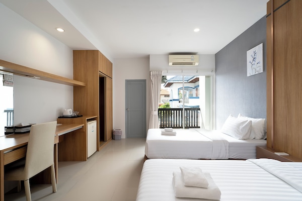 Habitación superior con 2 camas individuales | Wifi gratis y ropa de cama