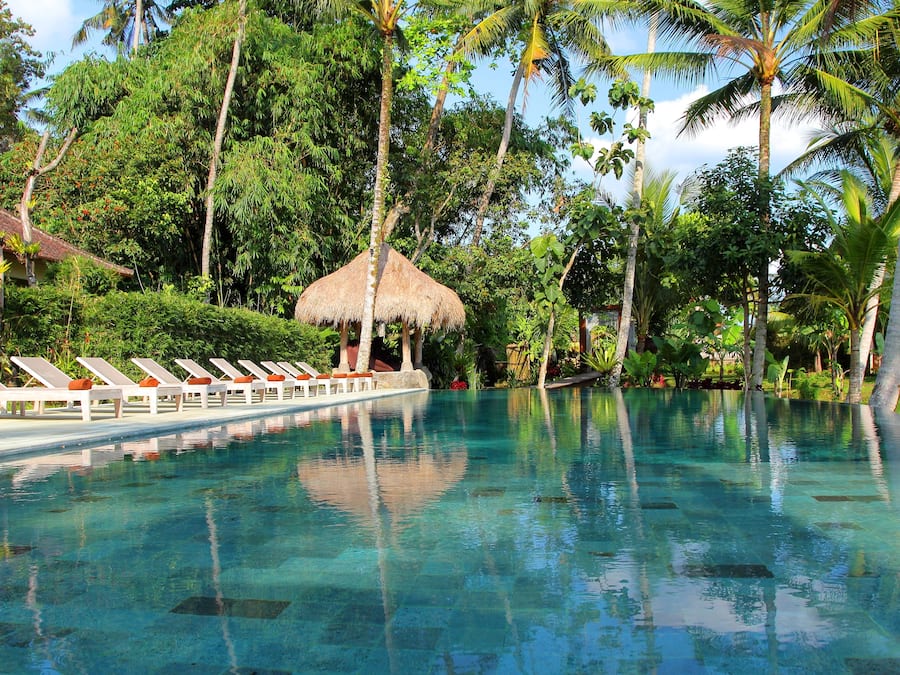 Outdoor pool, open 8:00 AM to 6:00 PM, pool umbrellas, pool loungers