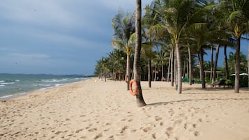 Private beach, white sand, beach umbrellas, beach towels