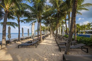 Private beach, white sand, beach umbrellas, beach towels