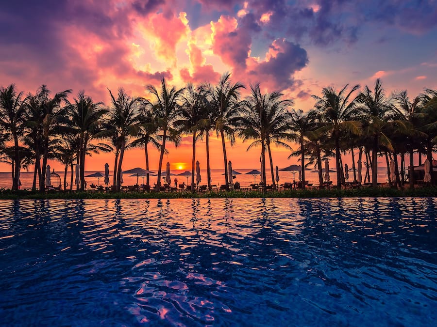 Outdoor pool, pool umbrellas, sun loungers