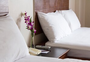 Kolmen hengen perhehuone | Työpöytä, pimennysverhot, silitysrauta/-lauta, ilmainen Wi-Fi