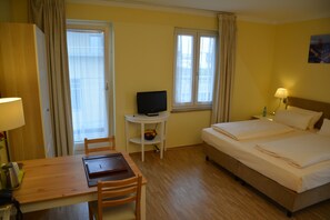 Hypo-allergenic bedding, minibar, desk, blackout curtains