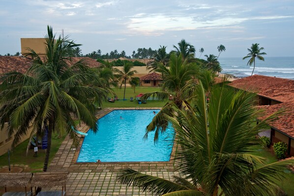 Outdoor pool, pool umbrellas, pool loungers