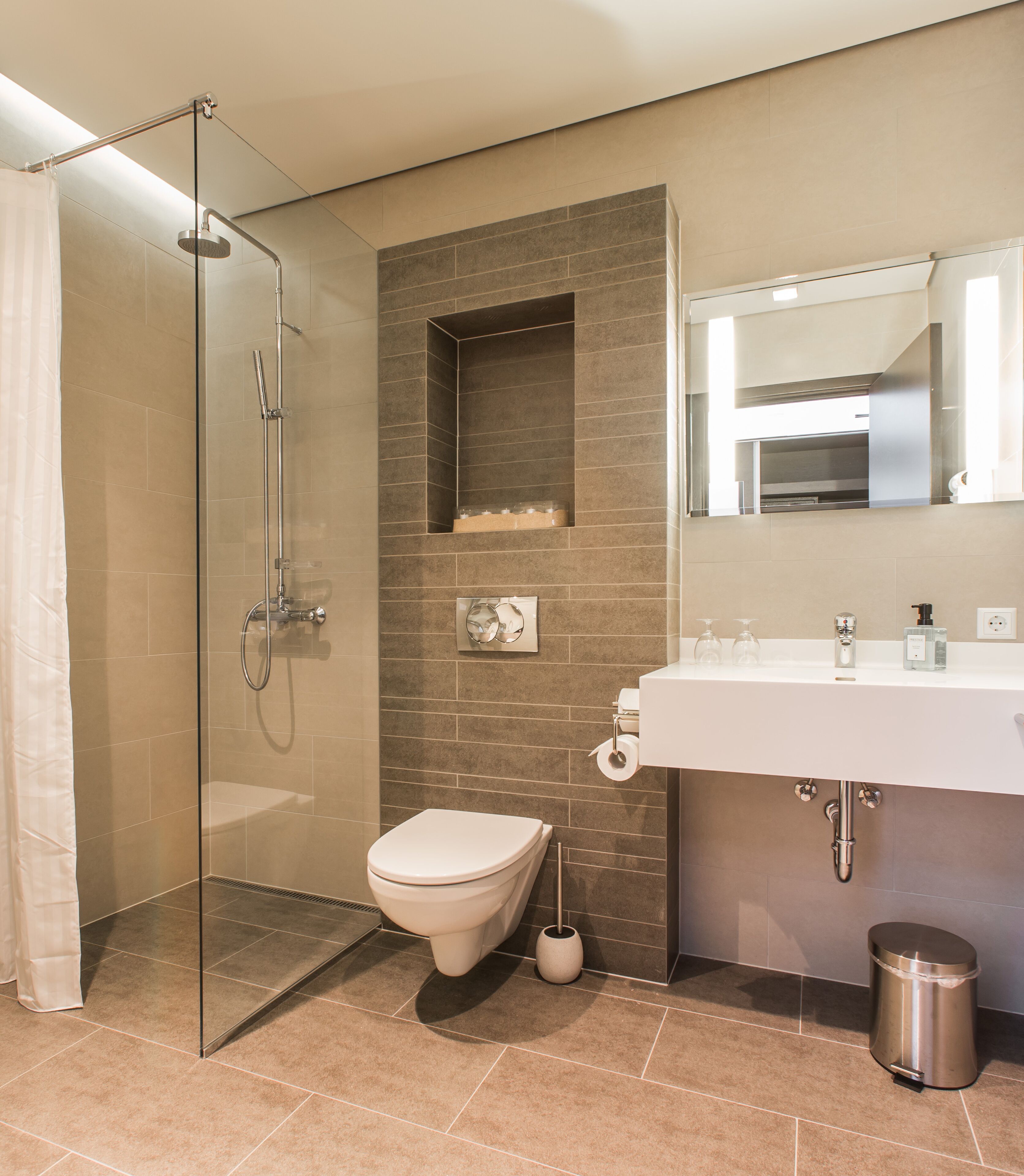 junior suite | bathroom | shower, hair dryer, towels