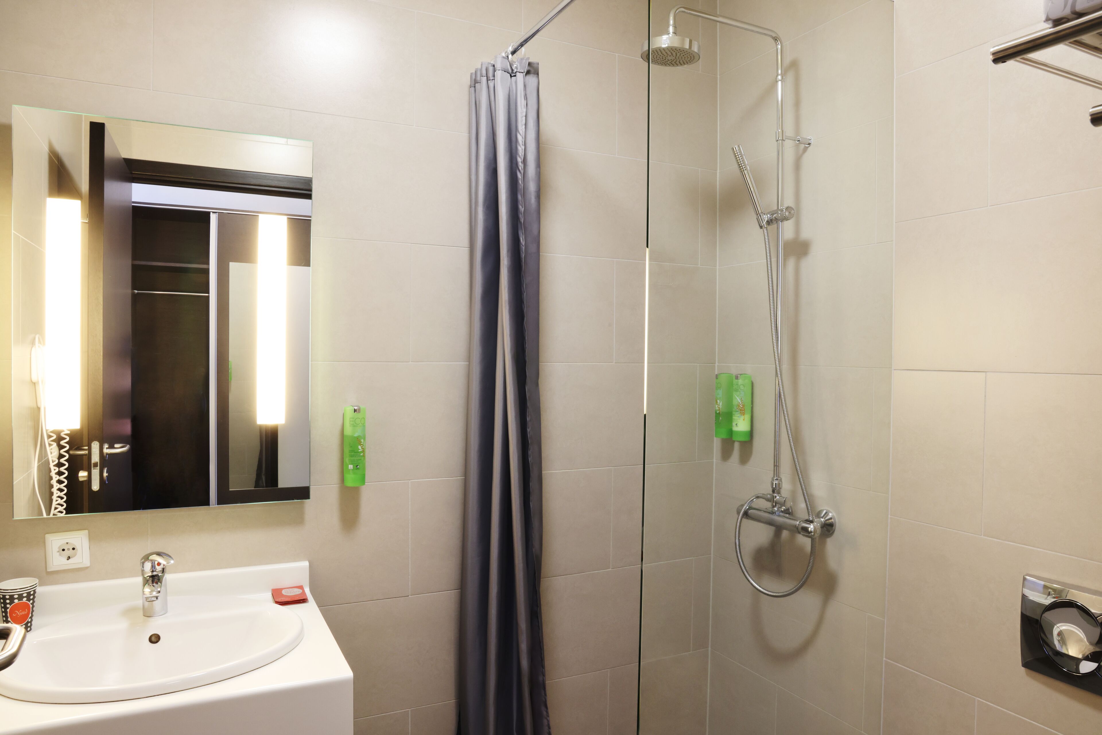standard triple room | bathroom | shower, hair dryer, towels