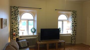 Apartment, 1 Bedroom | Living area | LCD TV