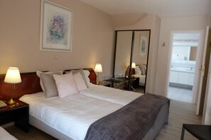 Down duvets, minibar, desk, cots/infant beds