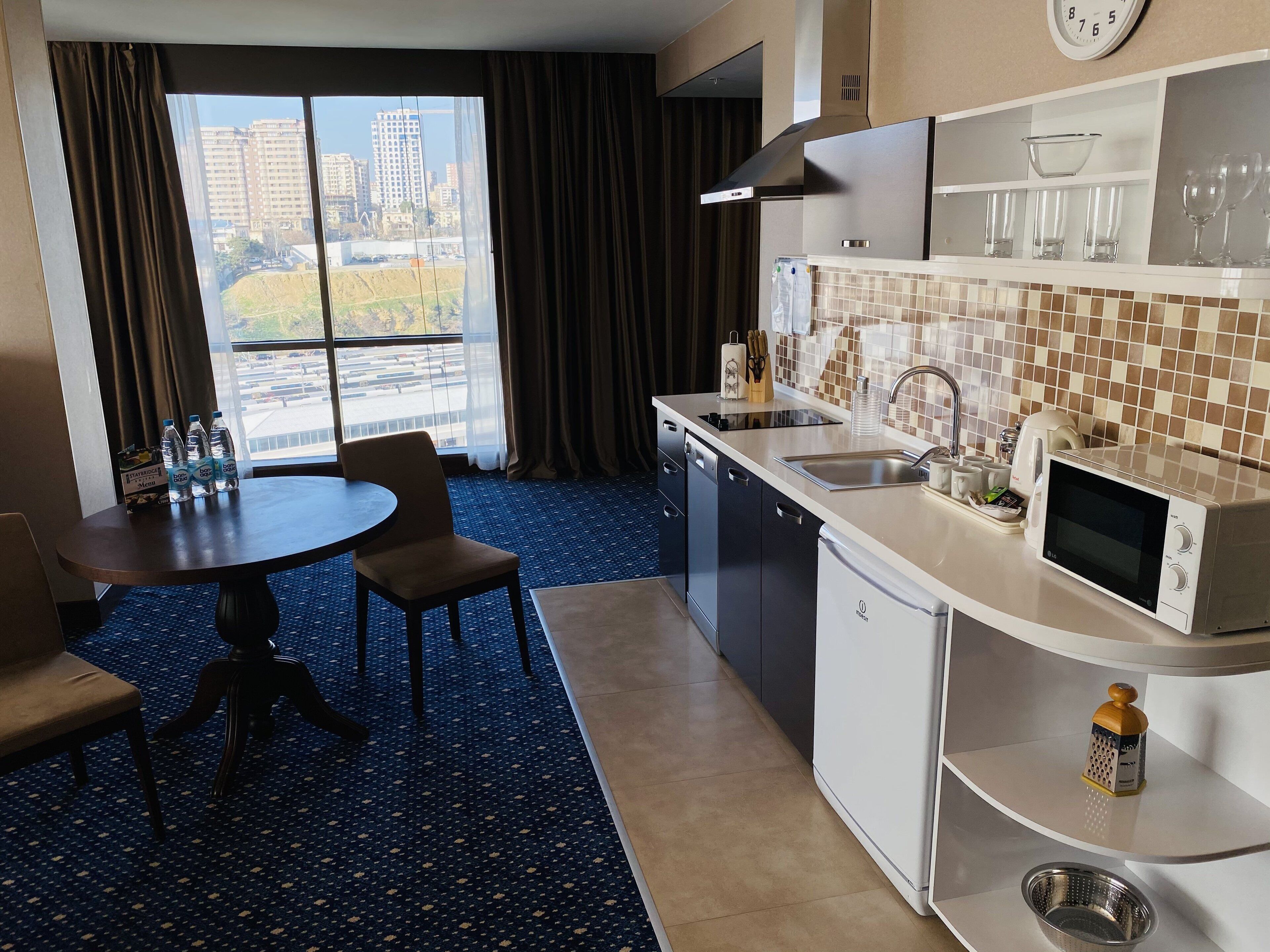 suite, 1 bedroom, kitchen (1 king bed) | private kitchen | fridge, microwave, coffee/tea maker, electric kettle