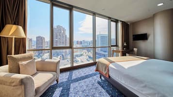 Premium bedding, down comforters, in-room safe, desk