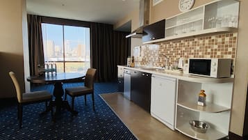 Fridge, microwave, coffee/tea maker, electric kettle