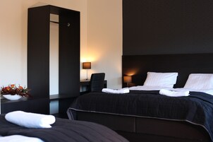 Triple Room | Desk, blackout drapes, iron/ironing board, free WiFi