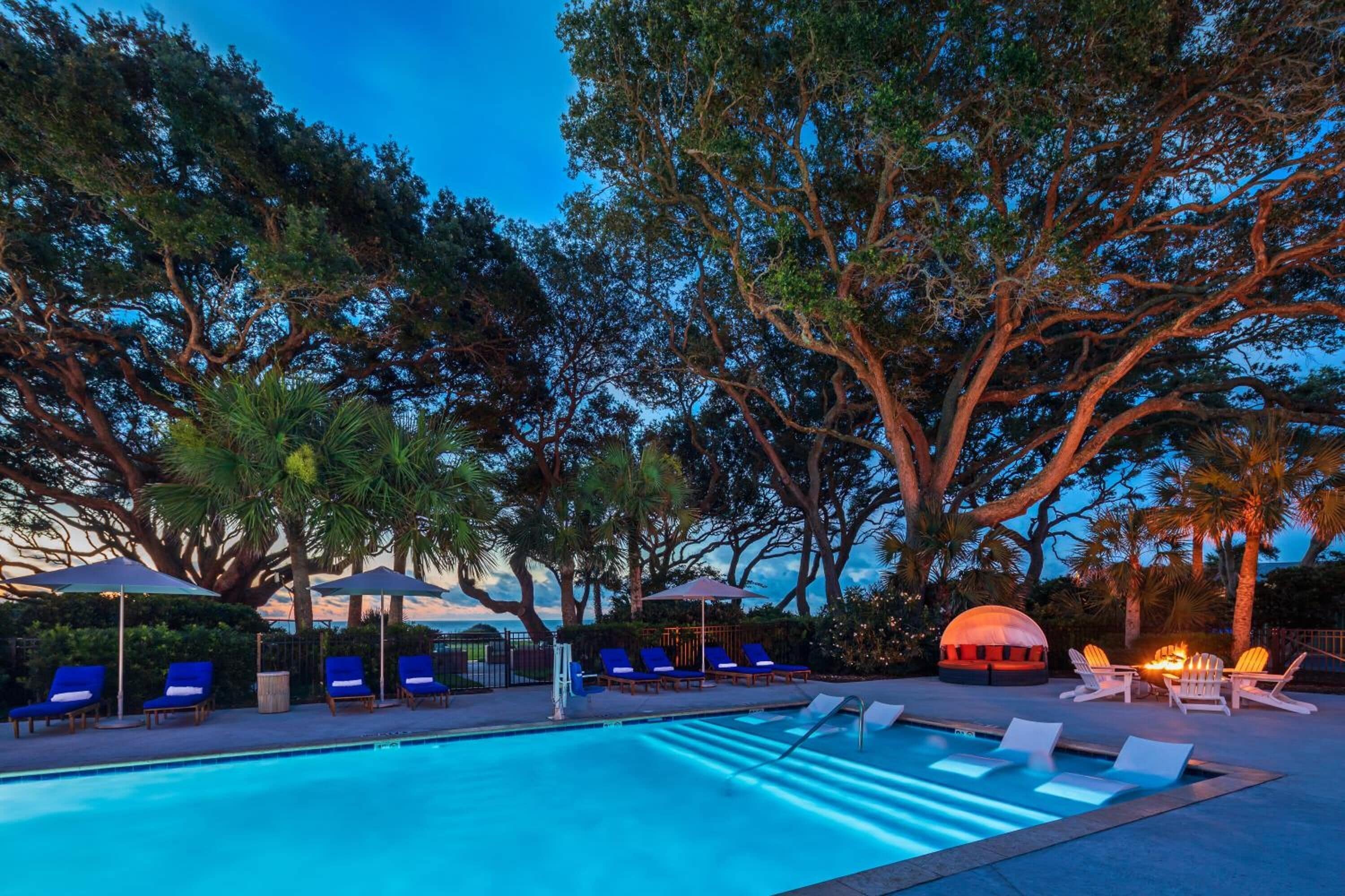 outdoor pool, open 9:00 am to 9:00 pm, pool umbrellas, pool loungers