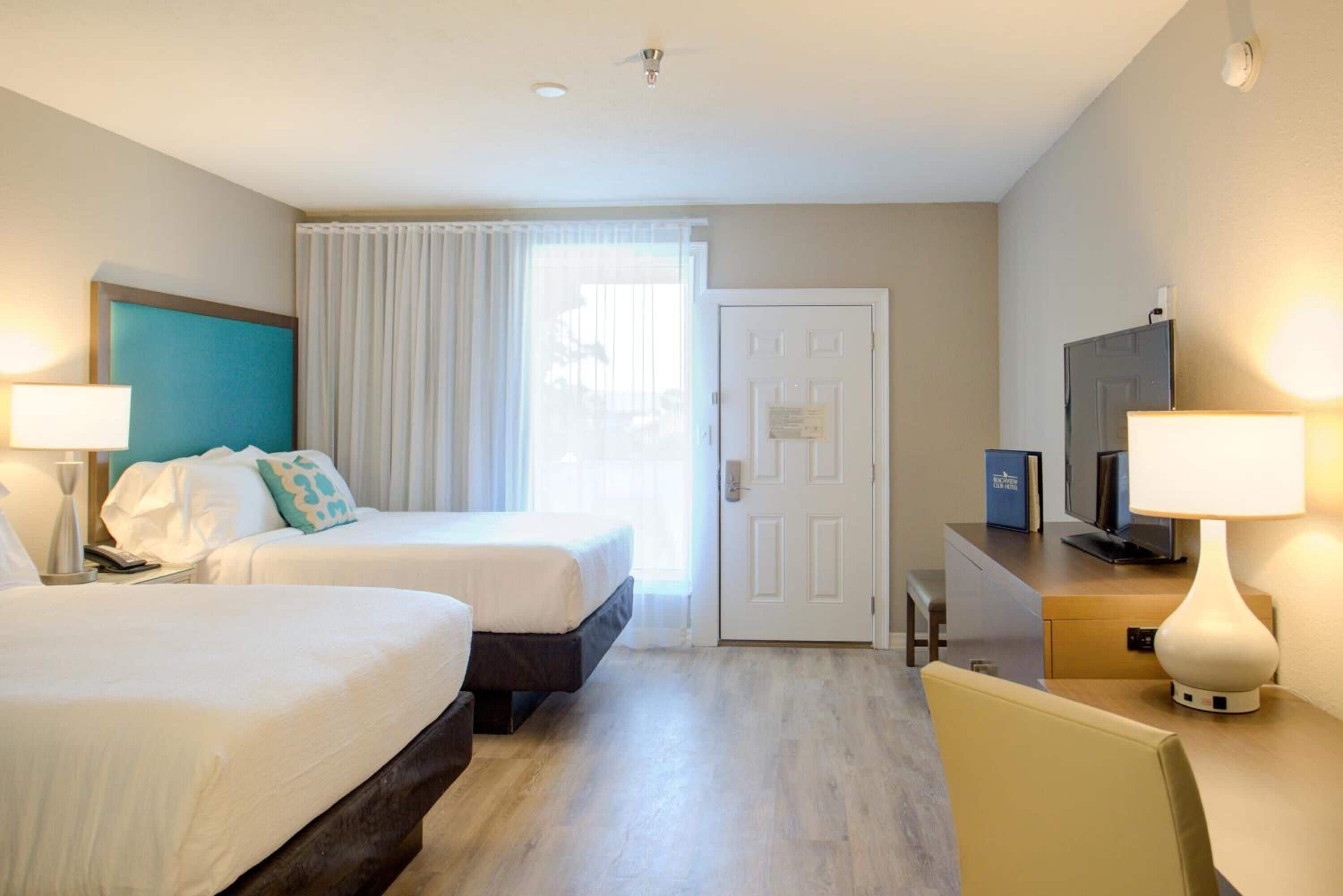 standard double room, 2 queen beds | in-room safe, desk, soundproofing, bed sheets