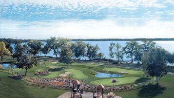 Enjoy a round of golf on our well-maintained putting green, surrounded by lush greenery and a tranquil water feature.