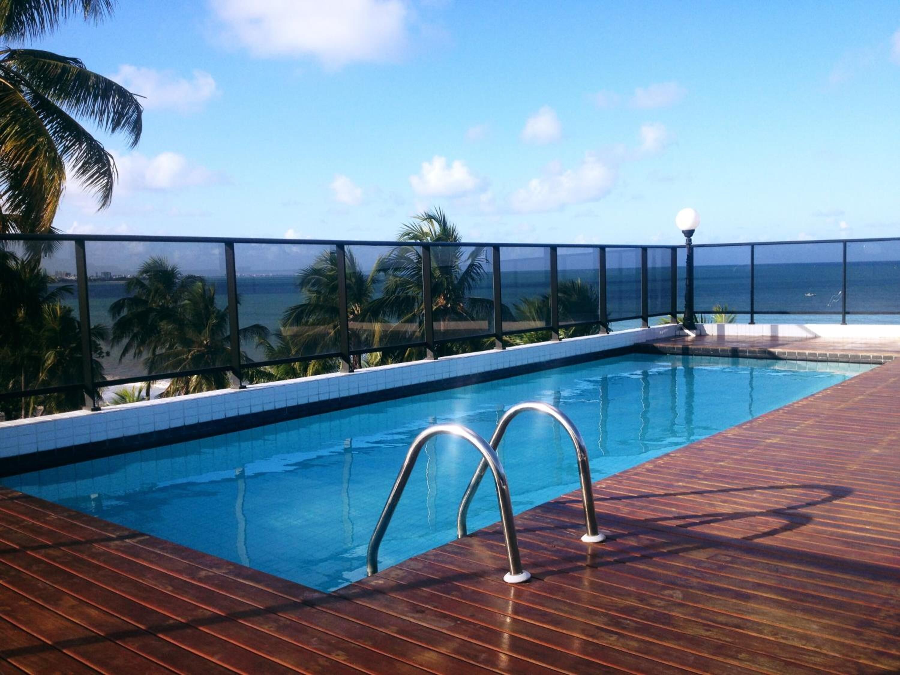 outdoor pool, pool umbrellas, pool loungers