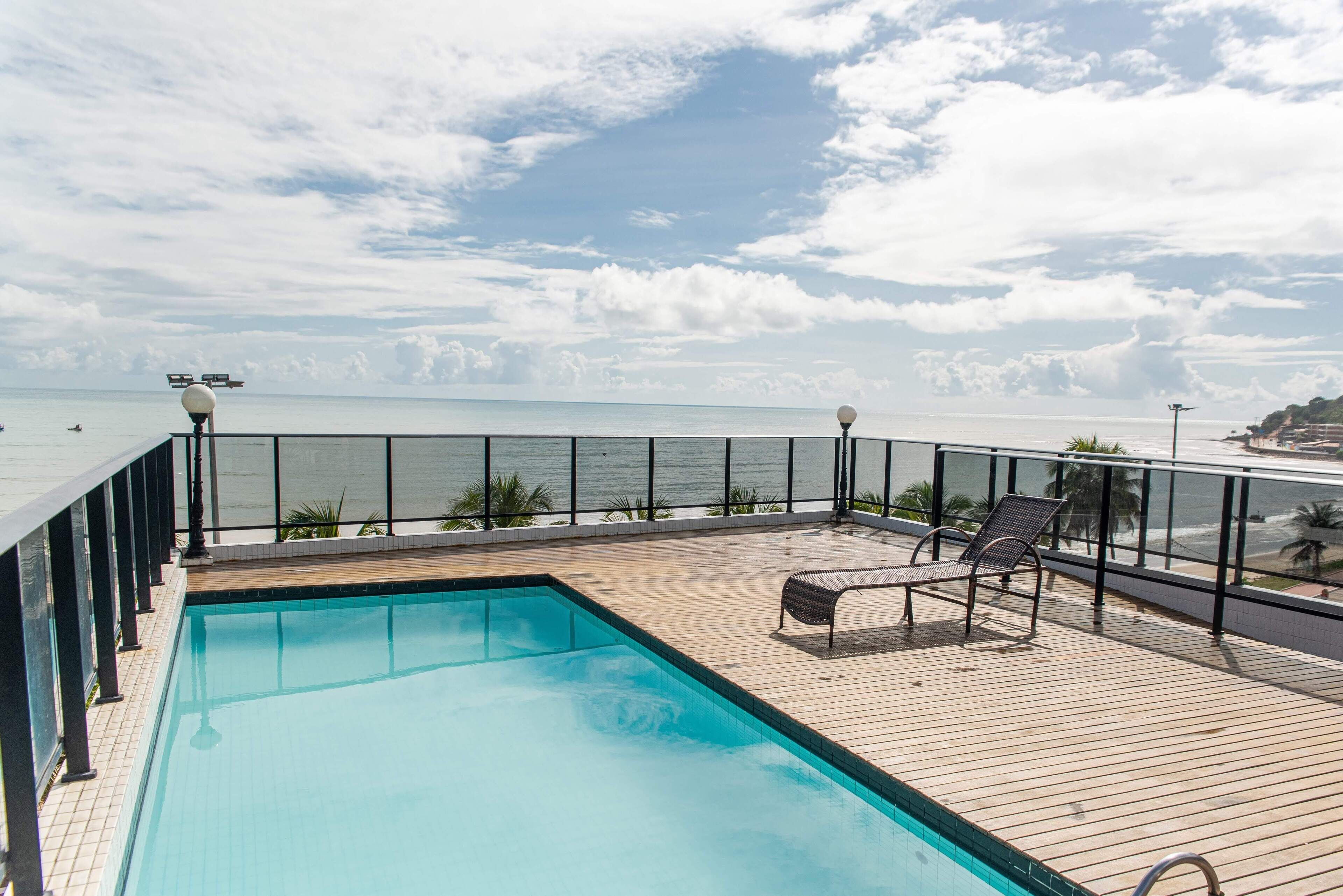 outdoor pool, pool umbrellas, pool loungers