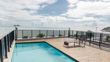 Outdoor pool, pool umbrellas, sun loungers