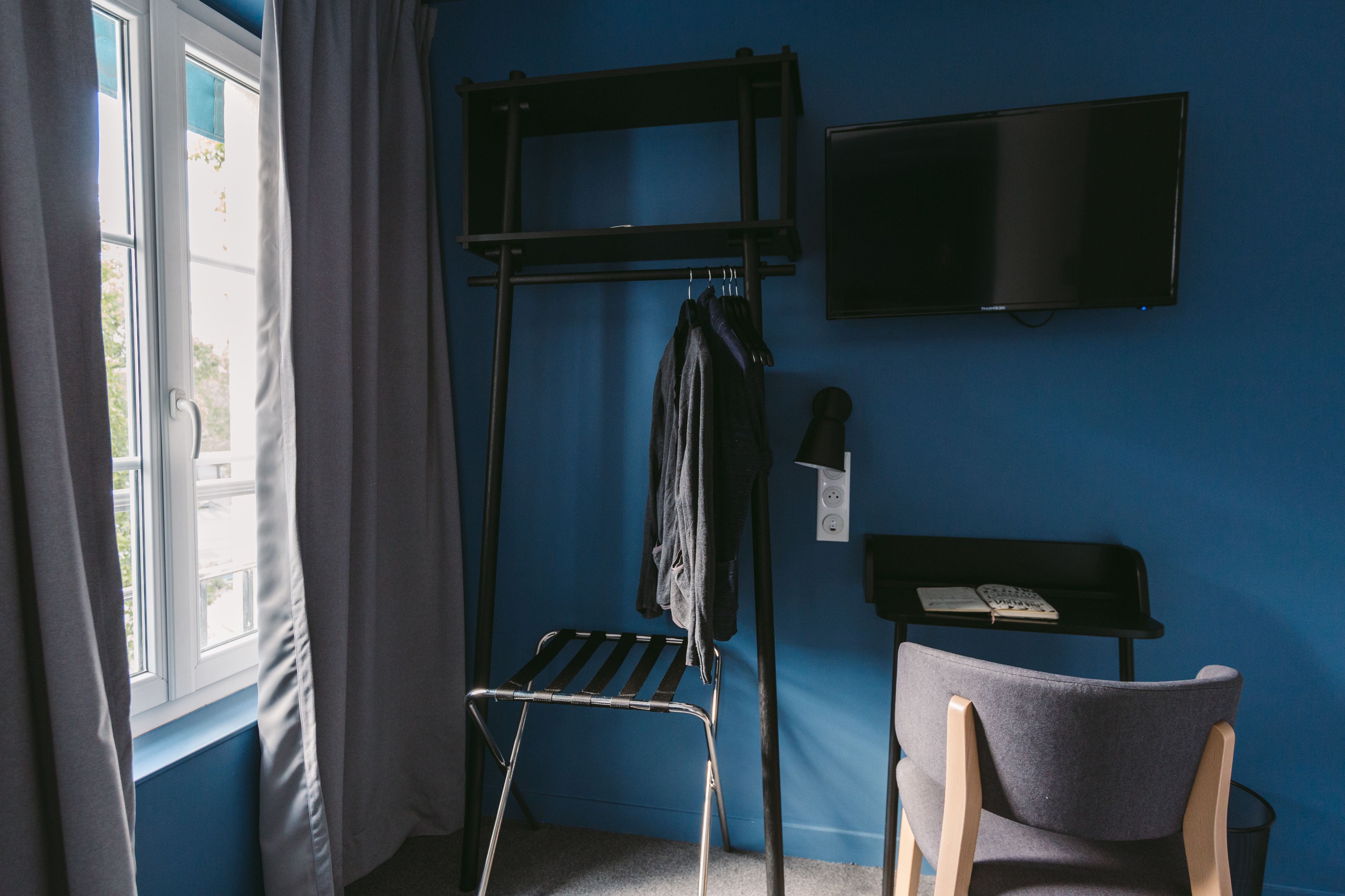 flirtatious room | premium bedding, desk, soundproofing, iron/ironing board