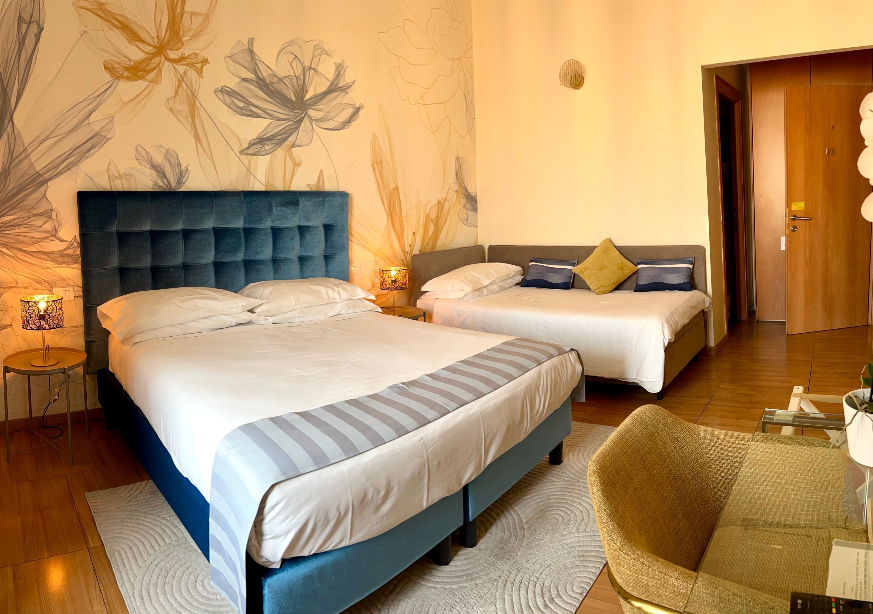 Standard Triple Room | Minibar, in-room safe, desk, iron/ironing board