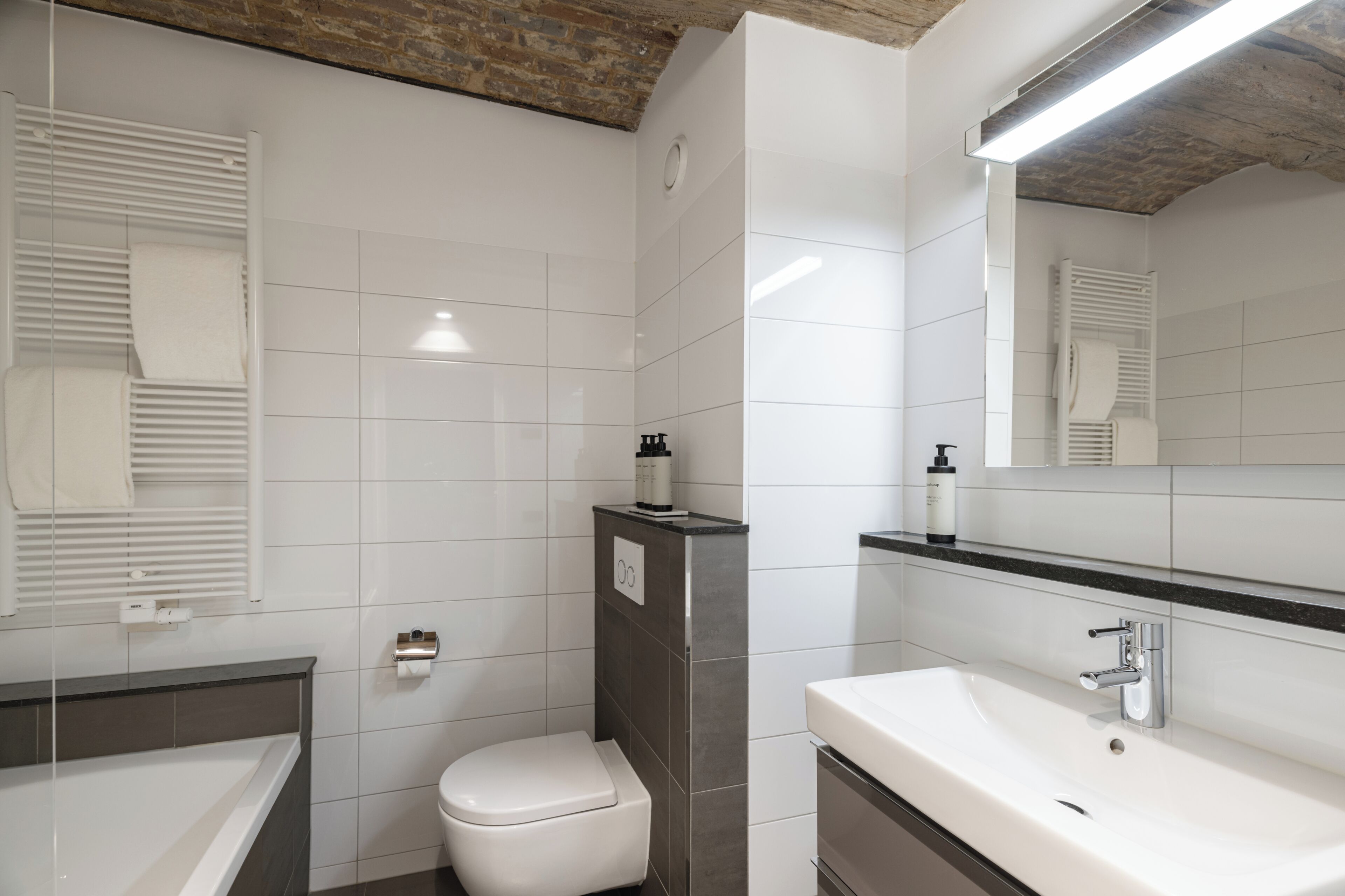 Deluxe Double Room | Bathroom | Eco-friendly toiletries, hair dryer, towels