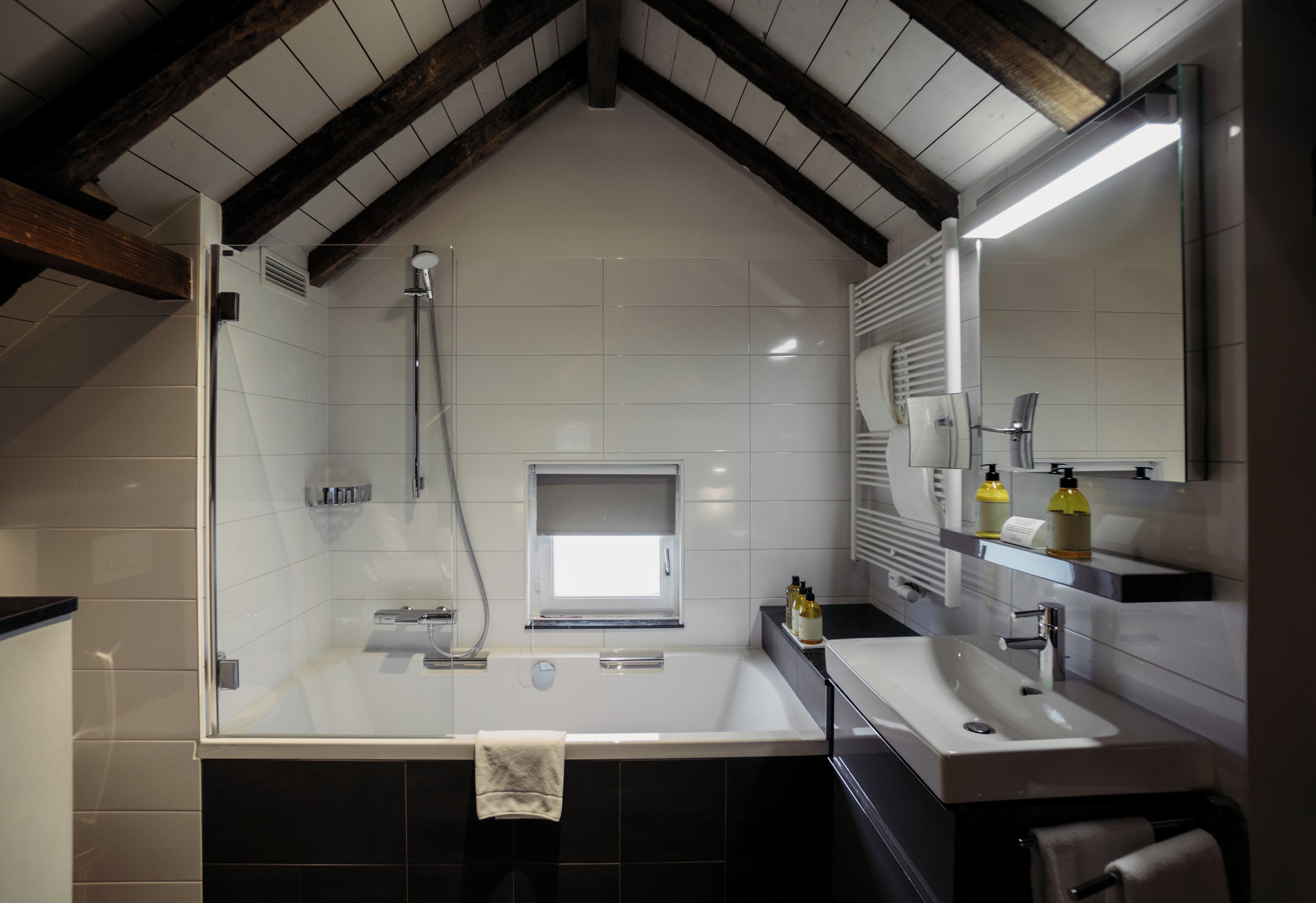 premium room | bathroom | eco-friendly toiletries, hair dryer, towels