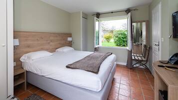 Standaard kamer | Luxe beddengoed, een kluis op de kamer, individueel gedecoreerd