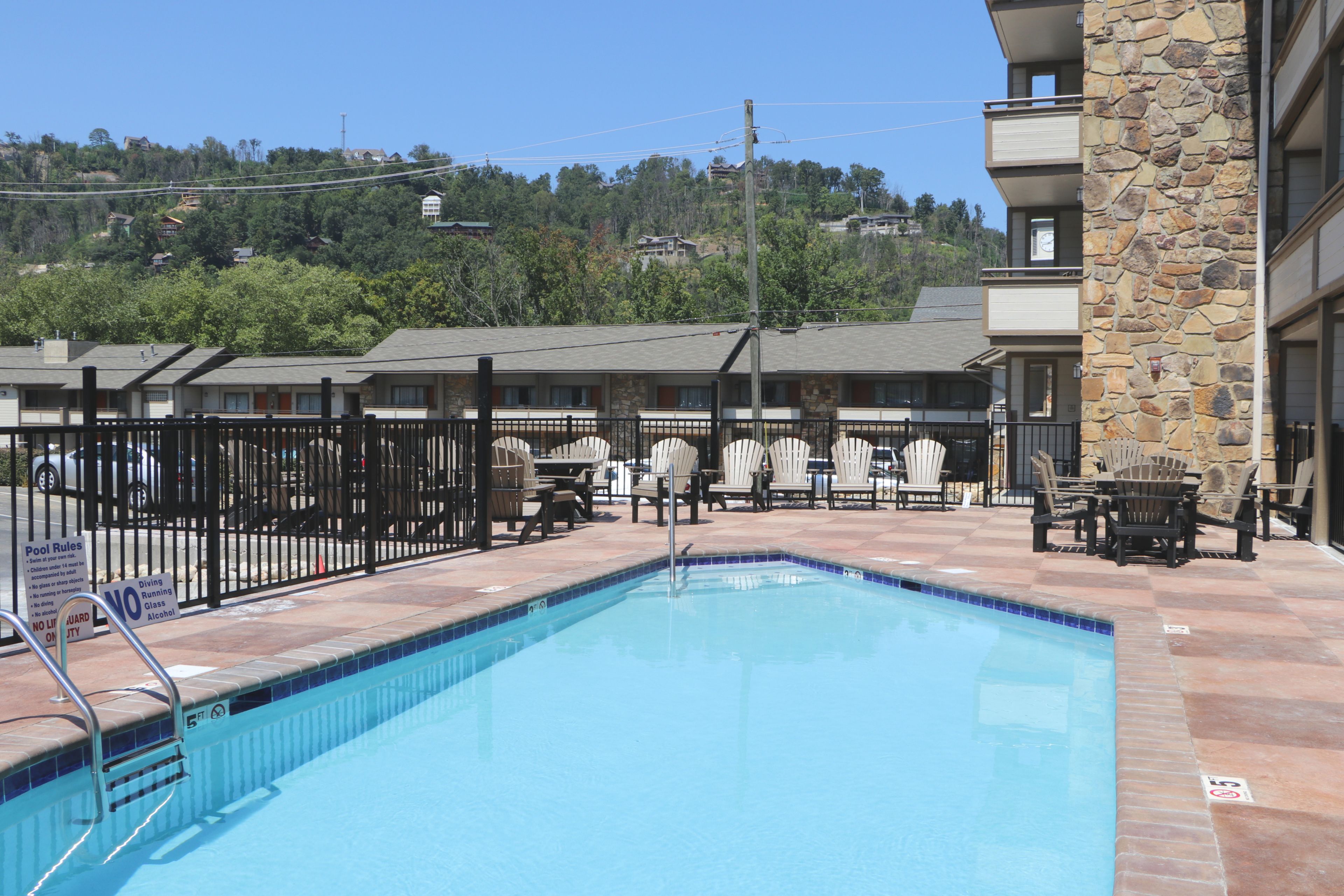 seasonal outdoor pool, open 10:00 am to 10:00 pm, pool loungers