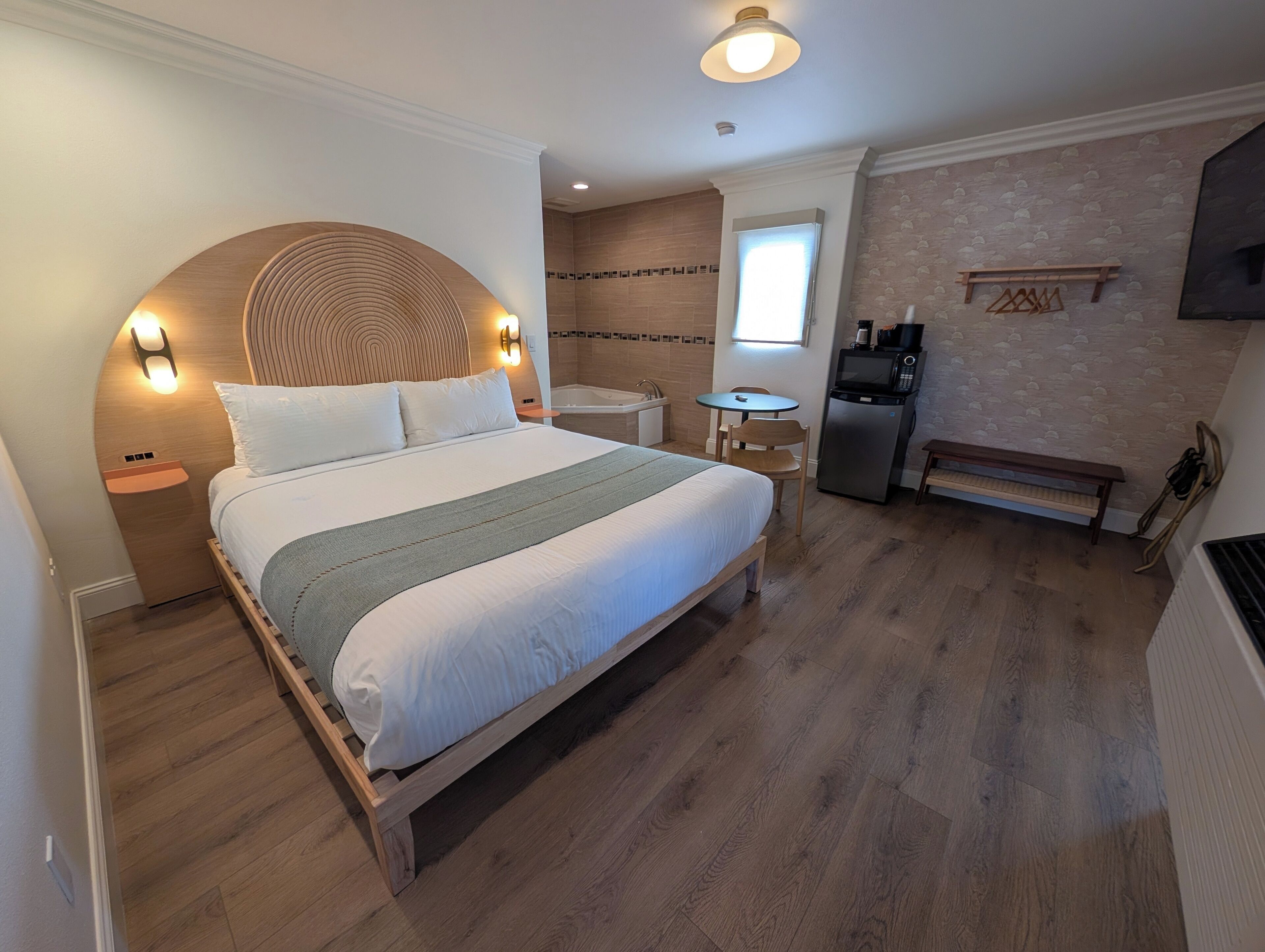 King Suite with Jacuzzi Tub - Renovated | Laptop workspace, blackout drapes, iron/ironing board, free WiFi