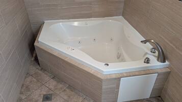 King Suite with Jacuzzi Tub - Renovated | Private spa tub