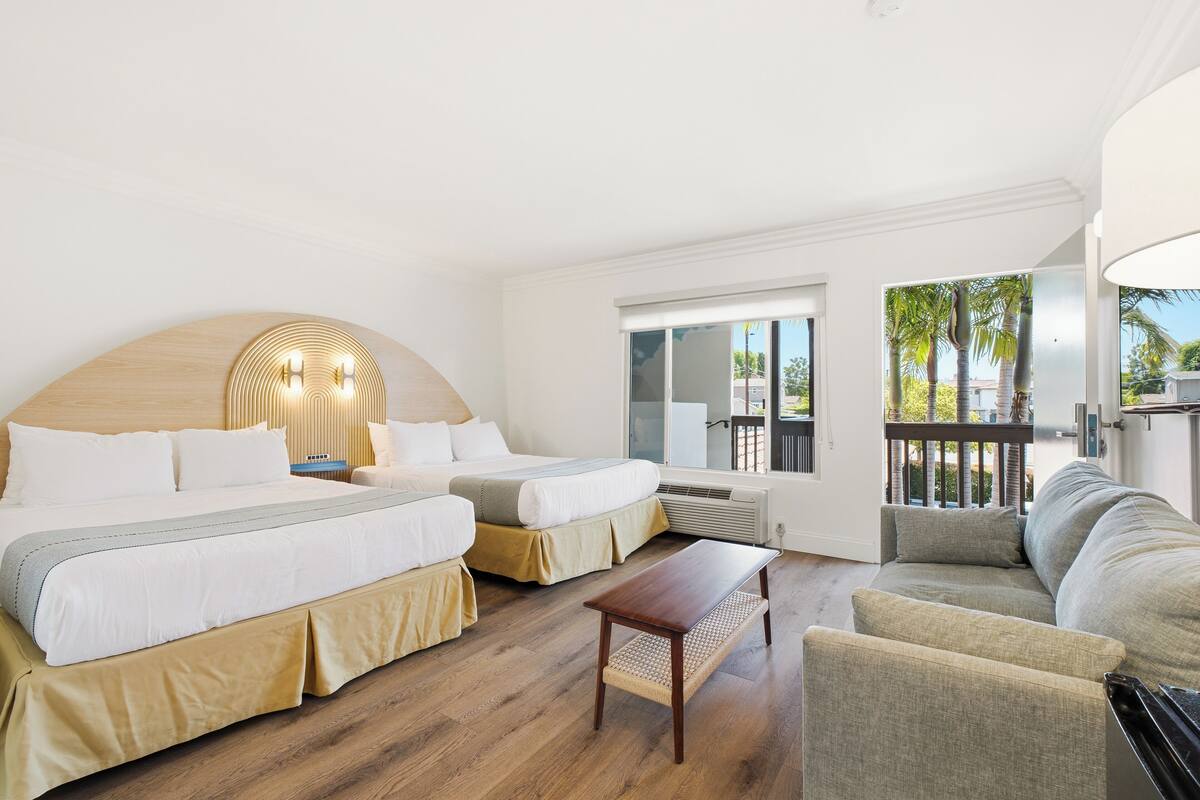 Deluxe Family Suite - Renovated | Laptop workspace, blackout drapes, iron/ironing board, WiFi (free)