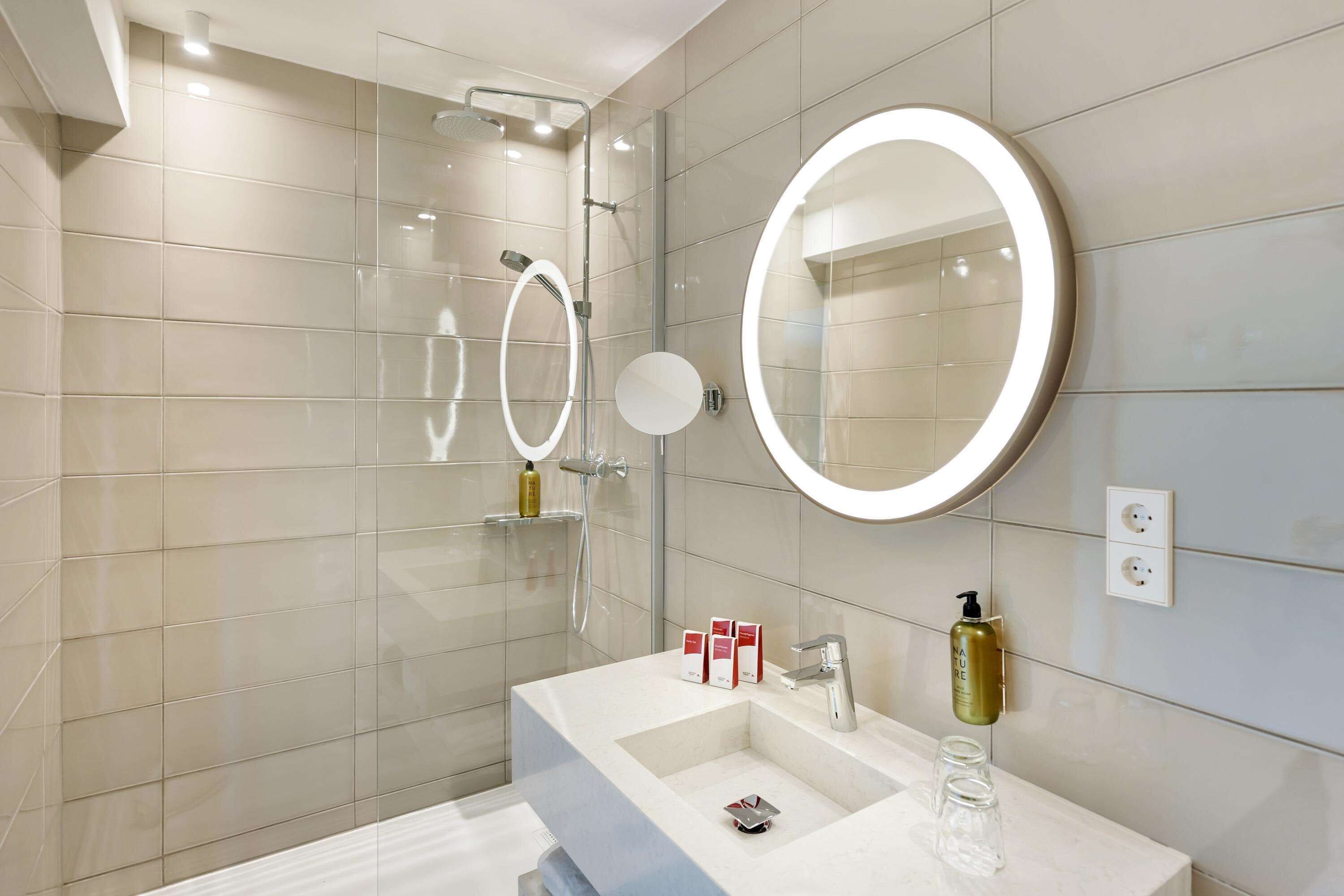 junior suite | bathroom | hair dryer, towels, soap, shampoo