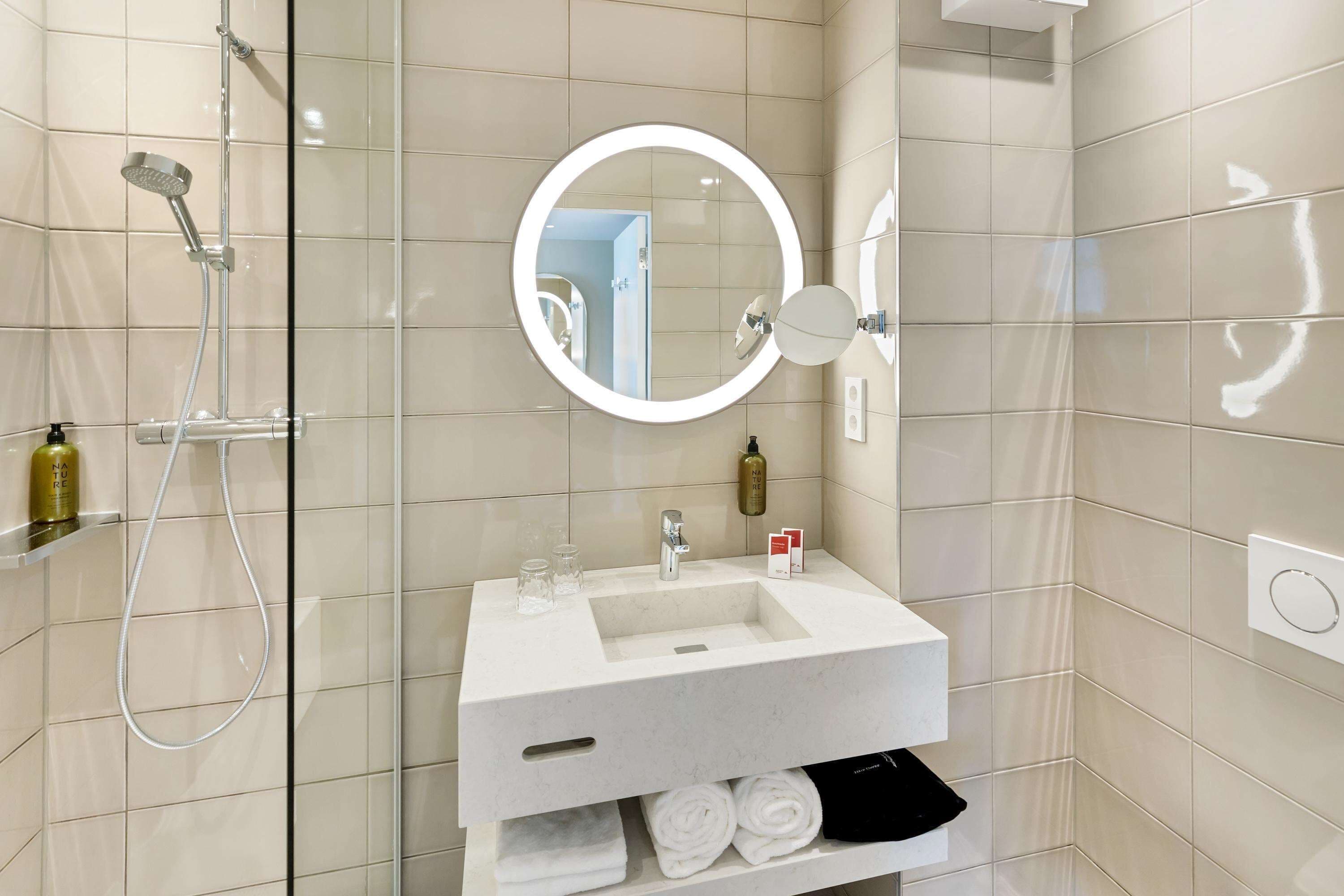 superior room | bathroom | hair dryer, towels, soap, shampoo