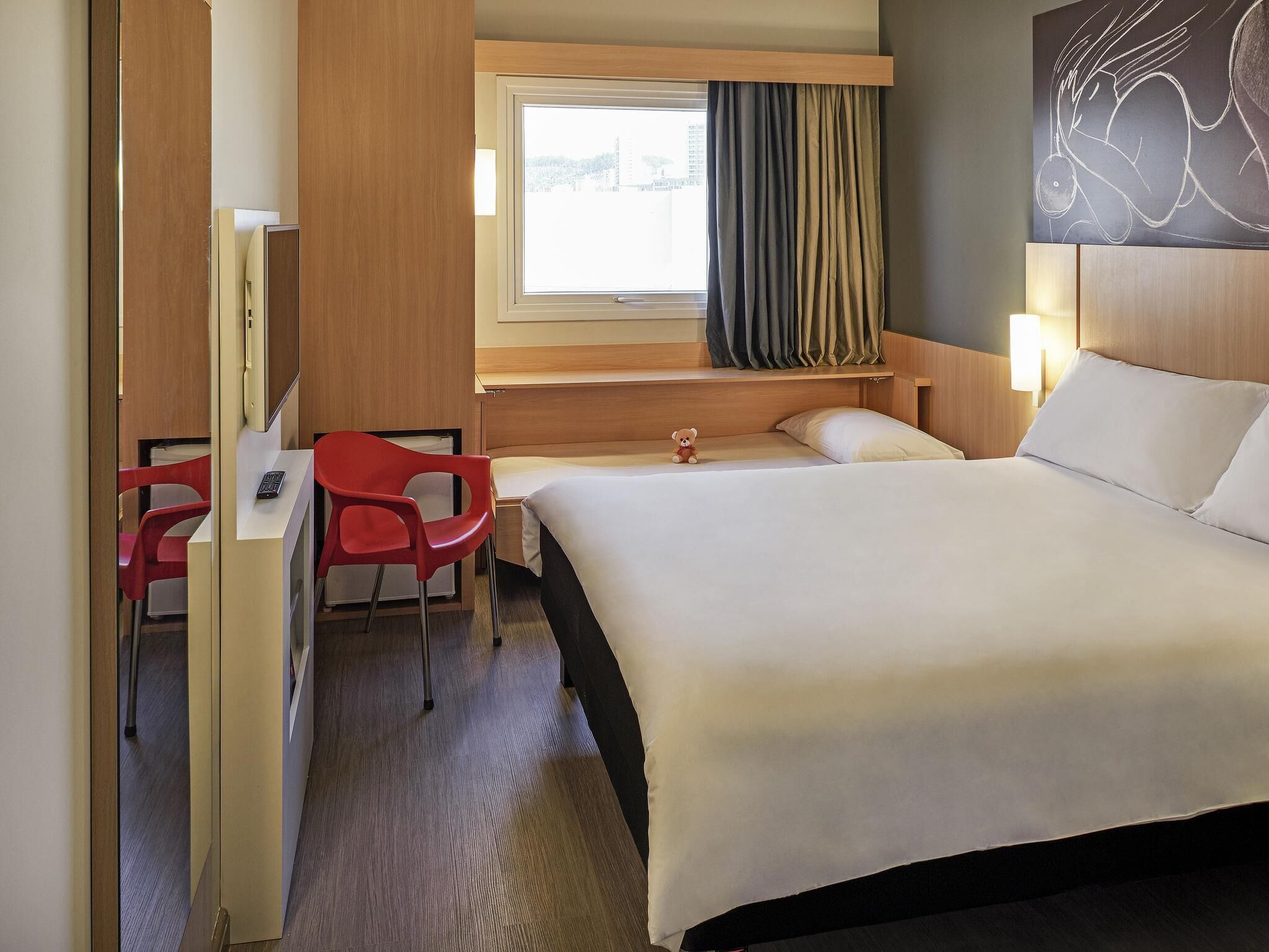 Standard Apartment, Multiple Beds | Minibar, in-room safe, desk, blackout curtains