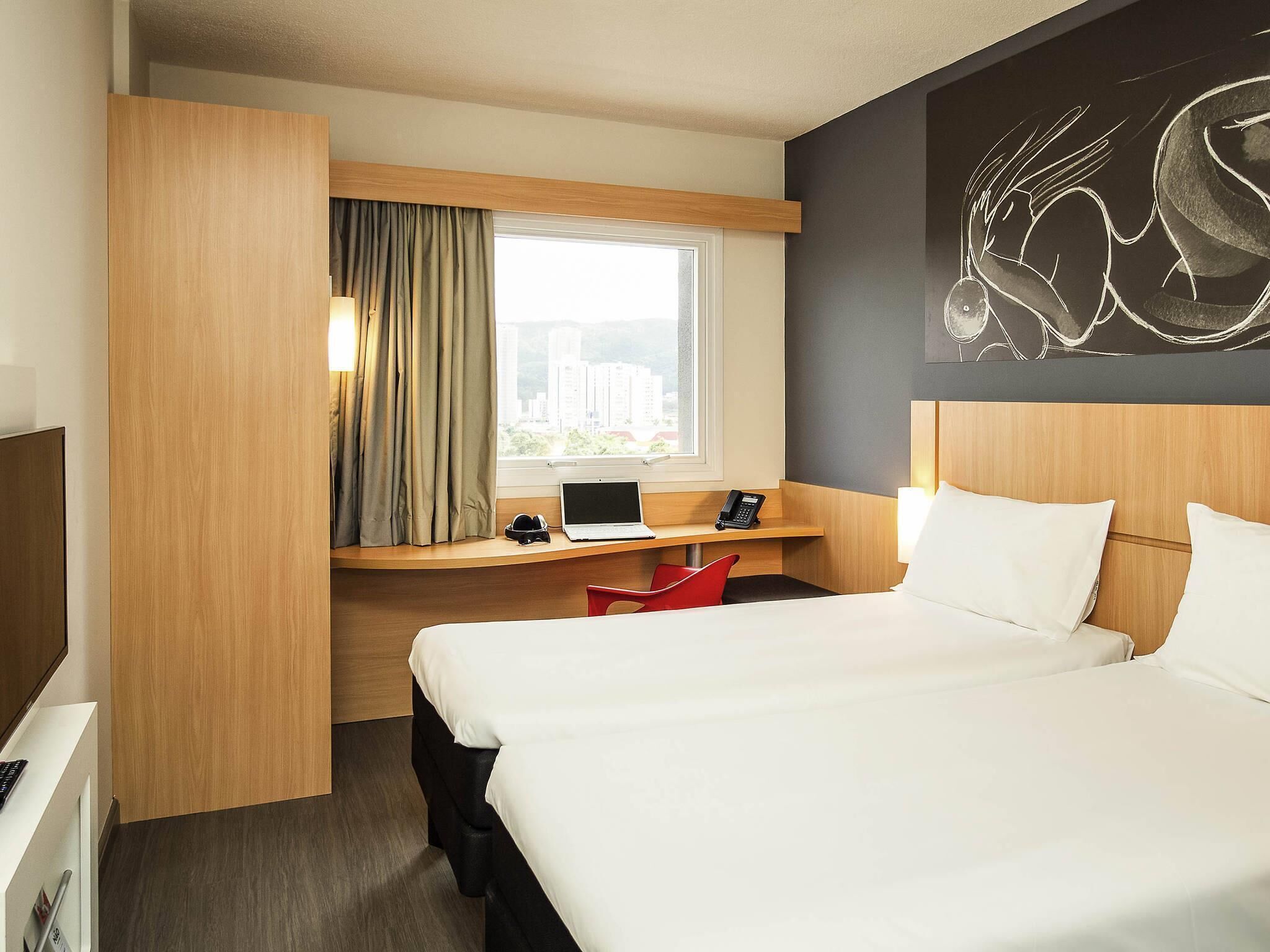 Standard Apartment, 2 Single Beds | Minibar, in-room safe, desk, blackout curtains