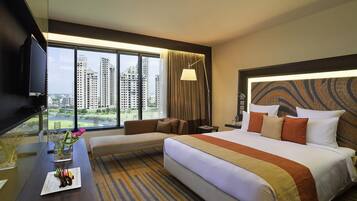 Seprai premium, selimut bulu angsa, minibar, dan brankas
