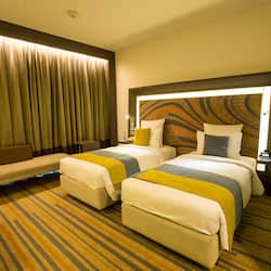Premium bedding, down duvets, minibar, in-room safe