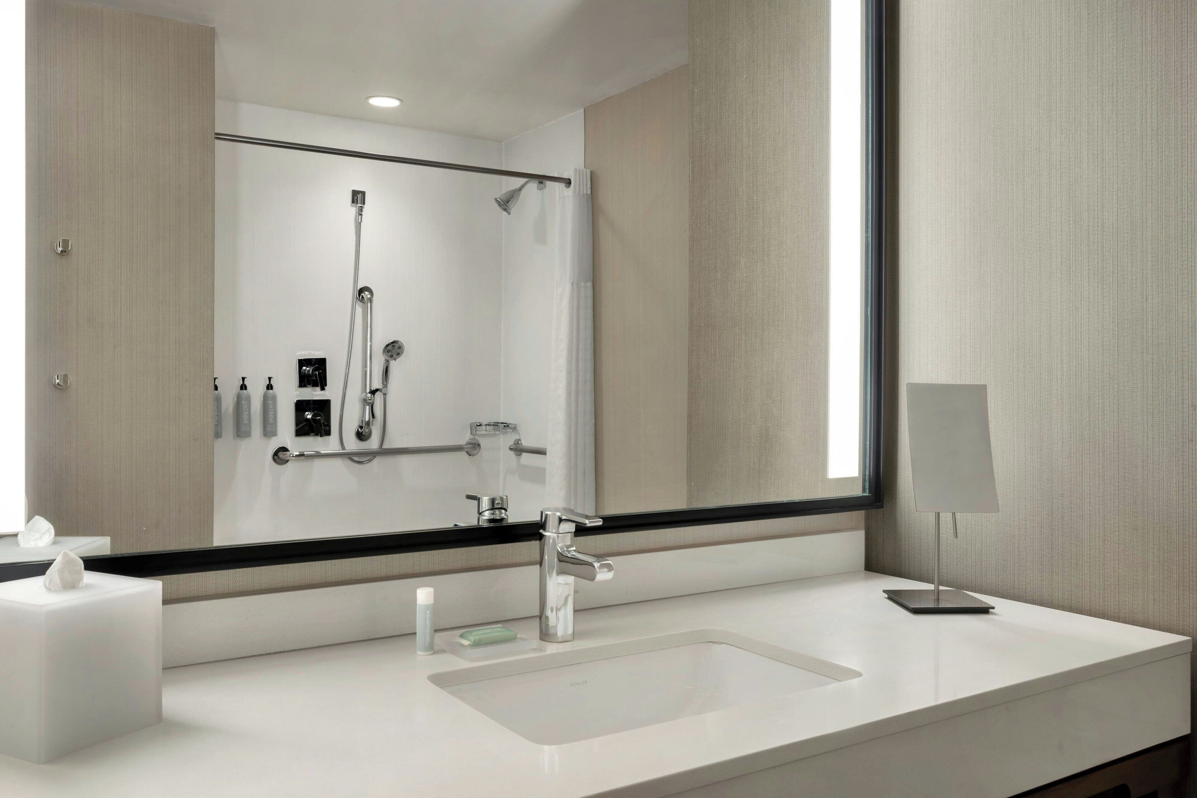 combined shower/bathtub, free toiletries, hair dryer, bathrobes