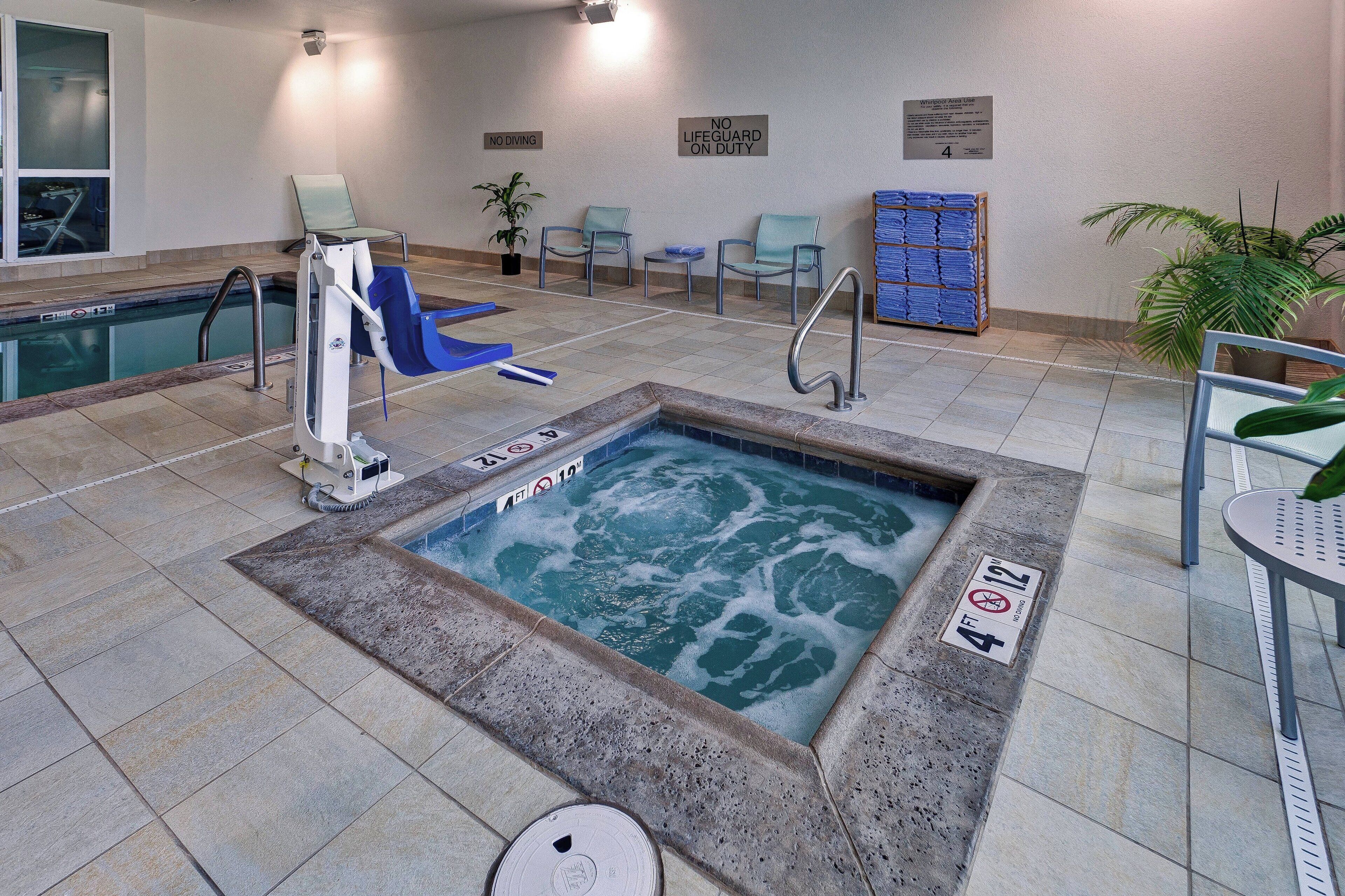 indoor pool, open 10:00 am to 9:00 pm, pool loungers