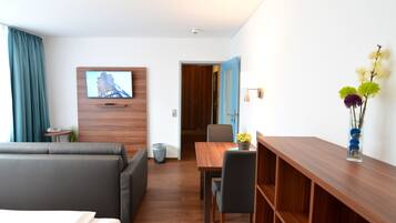 32-inch flat-screen TV with cable channels, TV