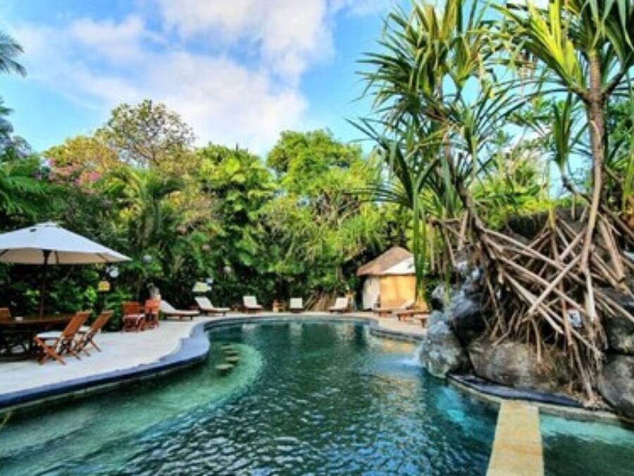 Outdoor pool, open 7:00 AM to 10:00 PM, sun loungers