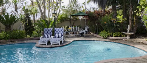 Outdoor pool, sun loungers