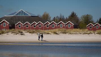 On the beach, white sand, beach towels